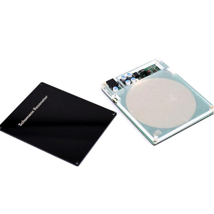 Schumann Resonator Device for Daily Relaxation and Wellness black cover and internal circuit board on table