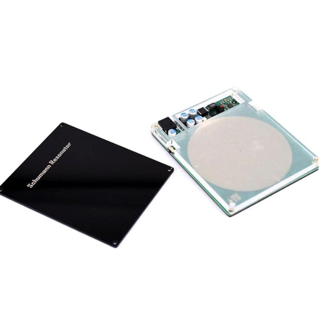 Schumann Resonator Device for Daily Relaxation and Wellness black cover and internal circuit board on table