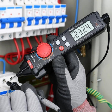 TASI Portable Pen Multimeter for Everyday Electrical Testing in use measuring voltage on household electrical panel, pen-style compact design