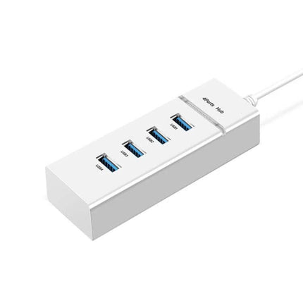Compact Four-Port USB Hub for Connecting Devices Daily - white compact USB 2.0 hub with four blue ports for home office cable management