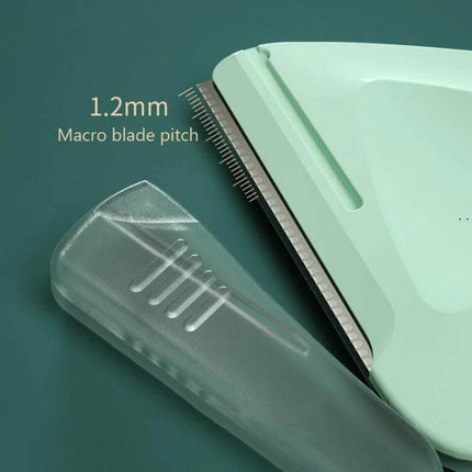 2 Piece Purple And Green Small Triangular Eyebrow Trimmer showing close-up stainless steel blade, 1.2mm macro blade pitch and protective cover