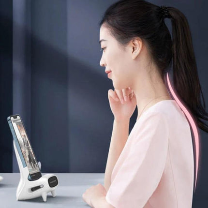 15W Loudspeaker Wireless Charge Stand For 4.5 To 11 Inch Phones And Tablets - woman using vertical phone stand with speaker and stable triangular base