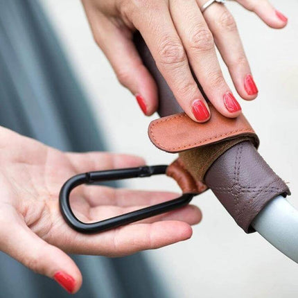 Two Pack Baby Stroller Carabiner Hooks, Brown and Black - leather stroller hooks holding diaper bag and toys on stroller handle