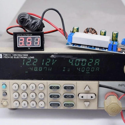 Adjustable DC Voltage Booster for Electronic Power Needs on test bench showing digital voltmeter and load readings