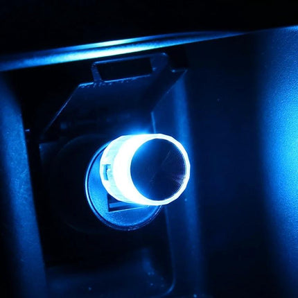 Car USB LED Atmosphere Lamp Multicolor Mood Lighting glowing blue in car USB port, compact 5V plug-and-play ambient light for dashboard and footwell