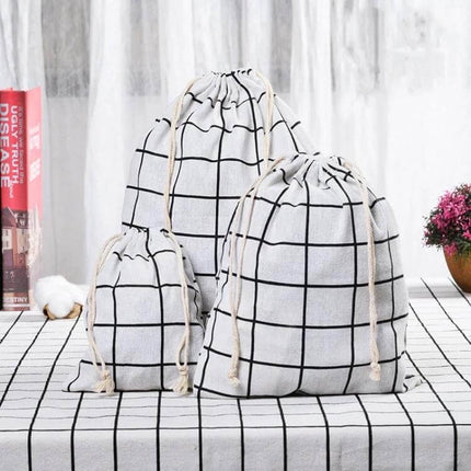 Cotton Linen Drawstring Sundries Storage Bag Three Sizes set of three breathable cotton-linen drawstring organizer bags in grid pattern