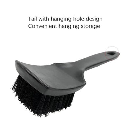 Effective Carpet and Upholstery Cleaning Brush with Curved Design shown with hanging-hole handle and dense bristles for carpets, upholstery and car interiors