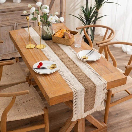 Cotton And Linen Woven Colorblock Table Runner Tassel Striped Rhombus on wooden dining table with neutral stripes, rhombus pattern and tassels, cotton and jute mix