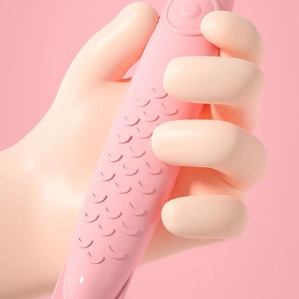 Cartoon Magnifying Glass Toy for Kids with Fun Animal Designs — pink handheld magnifier with textured fish-scale pattern, child-safe grip for exploring