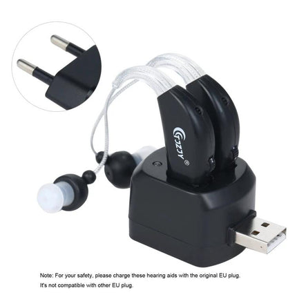 Rechargeable Hearing Aid for Seniors with Adjustable Amplification and Charging Base shown on USB charging dock with ear tips