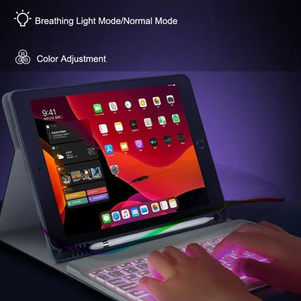 Compact 78-Key Backlit Bluetooth Keyboard for Phones and Tablets showing tablet stand, RGB backlight, and hands typing in low-light