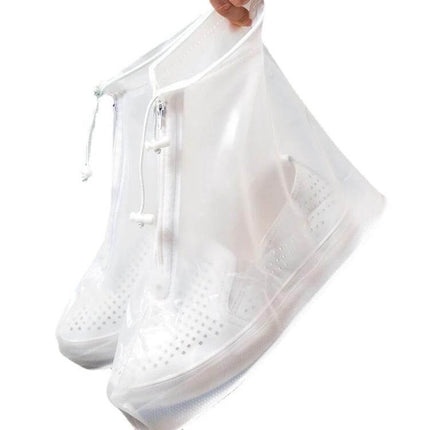 Waterproof Anti-Skid Shoe Covers for Rainy Outdoor Protection shown on white shoes being held, clear waterproof anti-slip shoe protectors