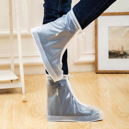 Waterproof Anti-Skid Shoe Covers for Rainy Outdoor Protection clear silicone boot covers shown on denim-clad feet for walking in rain