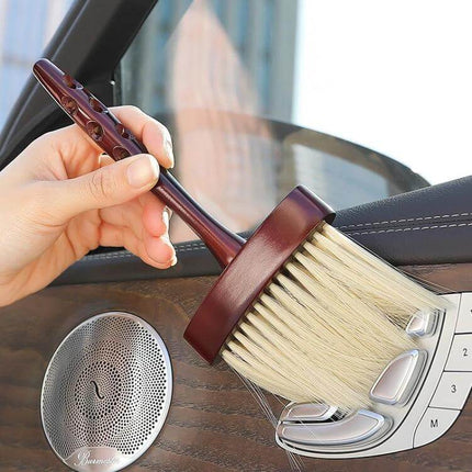 Soft Bristle Wooden Handle Dust Brush for Car Interior Cleaning gently dusting car vent and center console with lengthened wooden handle