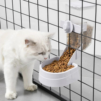 Hanging Feeder for Cats in Daily Home Care Routines - white wall-mounted gravity feeder attached to cage with cat eating dry kibble