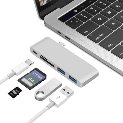 USB-C Multi-Port Docking Station with HDMI and Card Reader connected to laptop with USB drives, SD and microSD cards for file transfer and external display