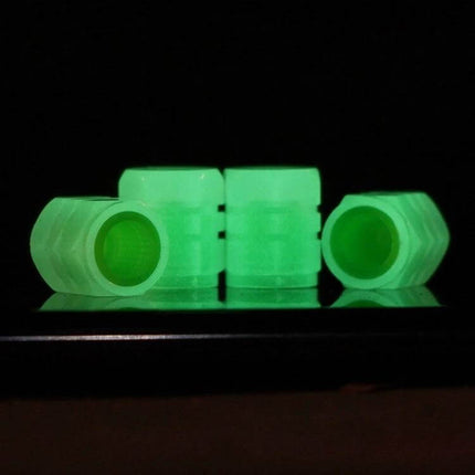 Luminous Tire Valve Caps 4pc Set for Cars and Motorcycles glowing green ABS caps shown in low-light, corrosion-resistant valve stem protectors