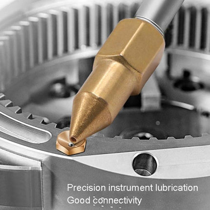 Essential copper grease fittings for vehicle and tool maintenance - close-up of copper grease fitting lubricating gear joint