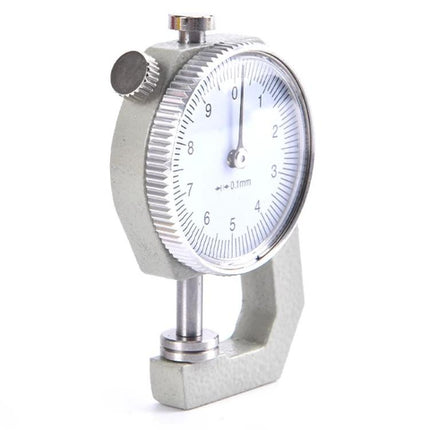 Dial Thickness Gauge for Leather, Paper, and Metal, 0-10mm - close-up of dial thickness gauge measuring materials