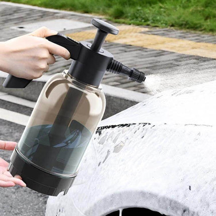 Handheld Foam Sprayer for Car Washing and Home Cleaning applying dense foam to a car hood for efficient cleaning
