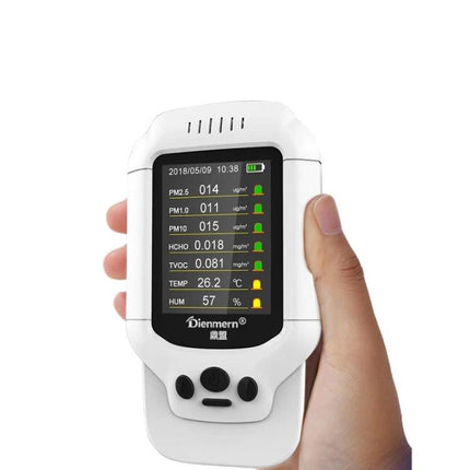 Portable Air Quality Detector for Formaldehyde and PM2.5 handheld device showing PM2.5 PM1.0 PM10 HCHO TVOC temperature humidity readings