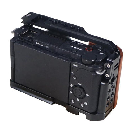 Aluminum Alloy Camera Cage with Wooden Handle for Sony ZV-E10 mounted on camera showing top handle and side controls