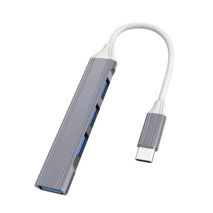 Compact 4-in-1 USB-C Docking Station for Multiple Device Connections slim aluminum hub with three USB-A ports and USB-C connector