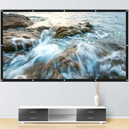 Portable Folding Projection Screen for Home Use showing ocean wave image on wall-mounted portable folding projection screen above console