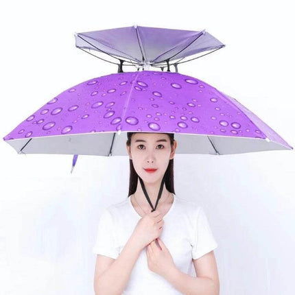 Double-Layer Folding Umbrella Hat for Fishing and Outdoor Protection shown in purple with water droplet pattern, hands-free rain and sun coverage