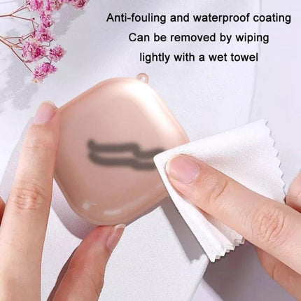 Essential Protective Case for Samsung Galaxy Buds in Daily Use - rose gold case being wiped clean with cloth showing waterproof, anti-fouling coating
