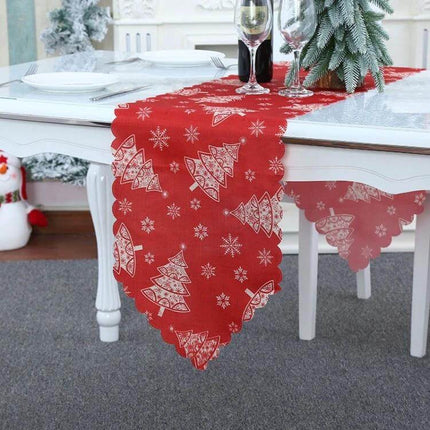 Christmas Table Runner 180 x 35 cm Flower Lattice Print on red cloth with white tree and snowflake motif, styled on dining table for holiday centerpiece