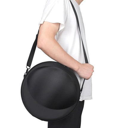 Travel Carry Bag For Harman Kardon Speakers With Padding black EVA hard shell case with shoulder strap, person carrying