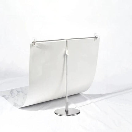 Adjustable Photography Backdrop Stand for Studio Sessions showing stainless steel stand with white backdrop set for portrait or product shoots