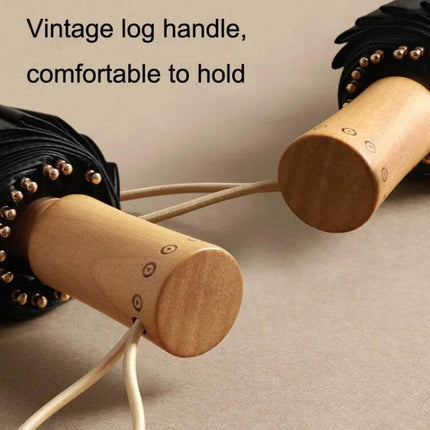 Retro Style Wooden Handle Folding Sunscreen Parasol with vintage wooden log handle folded close-up