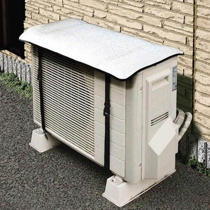 Universal Air Conditioner Cover 80 x 40 cm Rainproof protecting a compact outdoor AC unit from sun and light rain with secure PP buckle straps