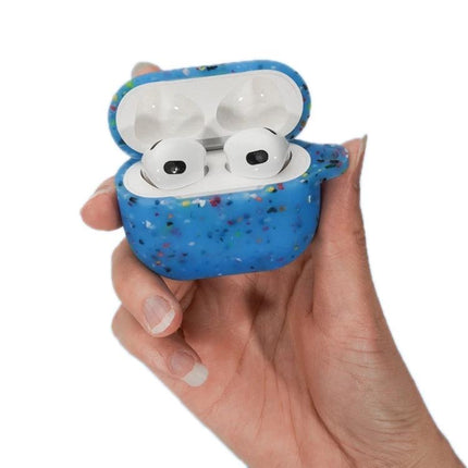 Protective Silicone Case for Daily AirPods Pro Protection in blue speckled design held in hand with carabiner loop