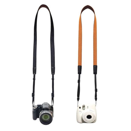 Black Denim Shoulder Strap for Cameras and Telescopes shown on two cameras, durable denim strap for secure, comfortable outdoor photography and stargazing