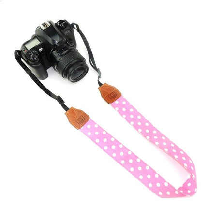 Retro Style Camera Shoulder Strap for Everyday Use - pink polka dot artificial leather and cotton strap attached to DSLR to reduce neck strain