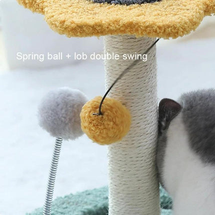 Turntable Cat Scratching Toy for Everyday Home Play - close-up of sisal post with spring ball and dangling pom-pom interactive toy