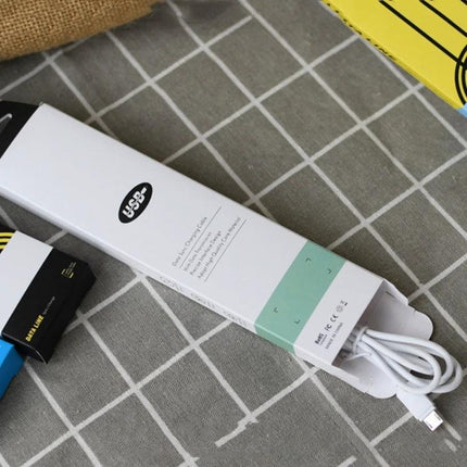 Data Cable Storage Boxes, 50-Piece Set in White, Black, Blue, Yellow - white cable organizer box on grid desk keeping small USB cable tidy