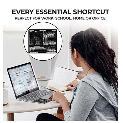 Adhesive Keyboard Shortcut Reference Sticker for PC Devices, Black on laptop keyboard showing user referencing shortcuts while working