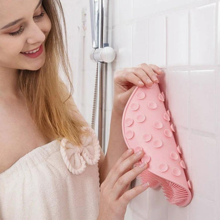 Bathroom Tool for Easy Back and Foot Care in Showers - pink TPR scrub pad attached to shower wall for gentle back and foot cleaning