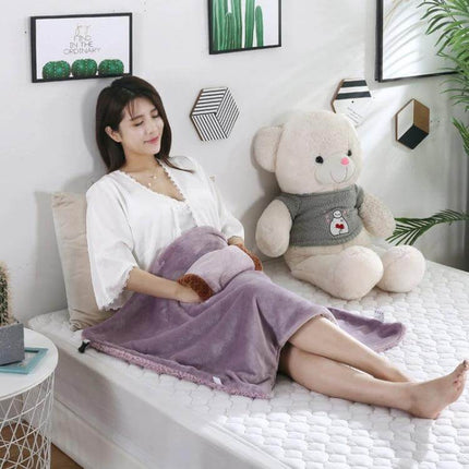 Electric Blanket With Hand Warmer Camel For Desk And Travel - woman using purple camel electric blanket with hand warmer on bed for desk travel comfort