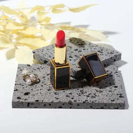 Set of Cave Stone Jewelry Display Stands for Photography showing lipstick and rings on textured stone platforms