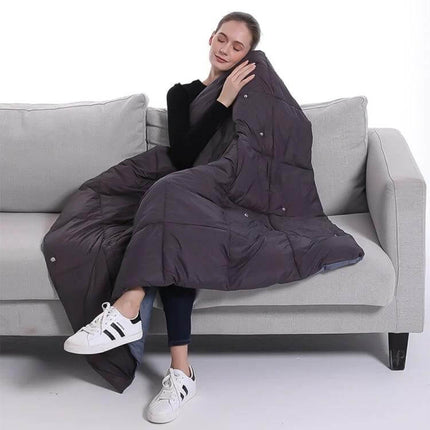 USB Electric Heating Shawl For Outdoor Winter Comfort - woman on sofa wrapped in USB heated shawl, one-button, three-temp, portable warmth
