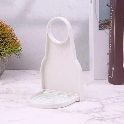 Practical Foldable Tray for Home Laundry Detergent Management white collapsible tray on counter holding detergent bottle, compact foldable storage solution