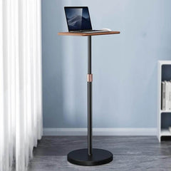 SSKY Adjustable Height Laptop Stand for Standing Workspaces shown in a minimal room with laptop on height-adjustable platform promoting better posture