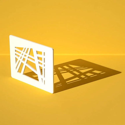 Light Shadow Board for Still Life and Portrait Photography: white patterned board casting geometric shadows on yellow background, waterproof studio prop