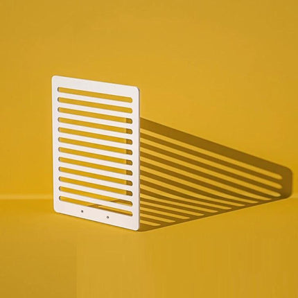 Light Shadow Board for Still Life and Portrait Photography shown upright on yellow background casting striped shadows
