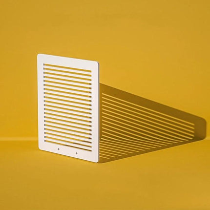 Light Shadow Board for Still Life and Portrait Photography — white slatted board casting striped shadow on yellow backdrop